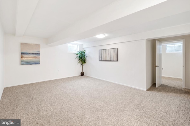 basement featuring carpet and baseboards