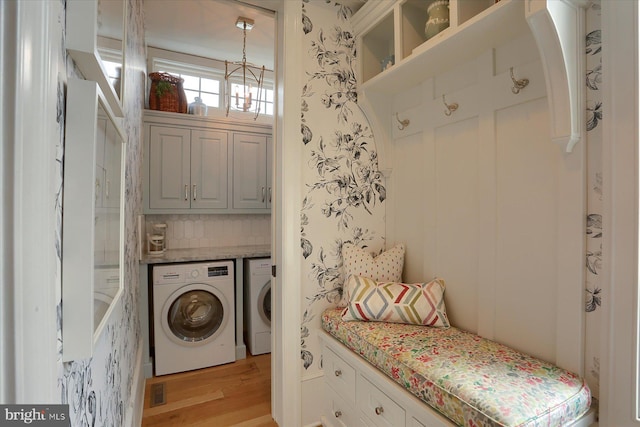 65 S College St, Carlisle, PA 17013 - washroom featuring light wood-style floors and washer and clothes dryer