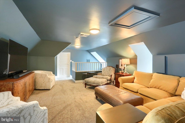 65 S College St, Carlisle, PA 17013 - living room featuring vaulted ceiling, carpet floors, and baseboards