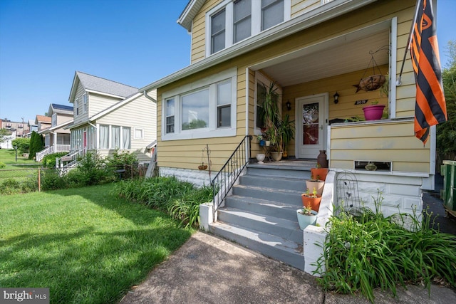 doorway to property featuring a residential view