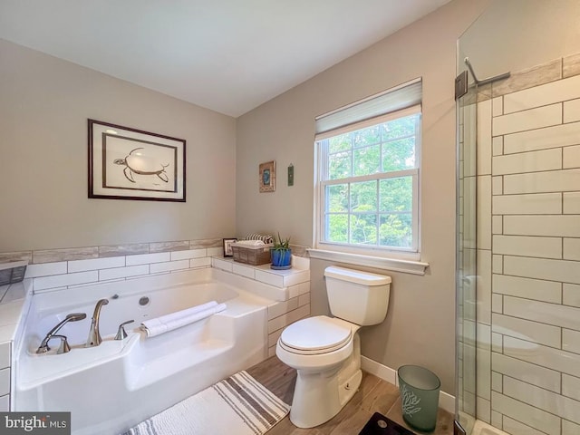 33 Laurel Cir, Newtown, PA 18940 - full bathroom featuring toilet, a bath, tiled shower, and wood finished floors