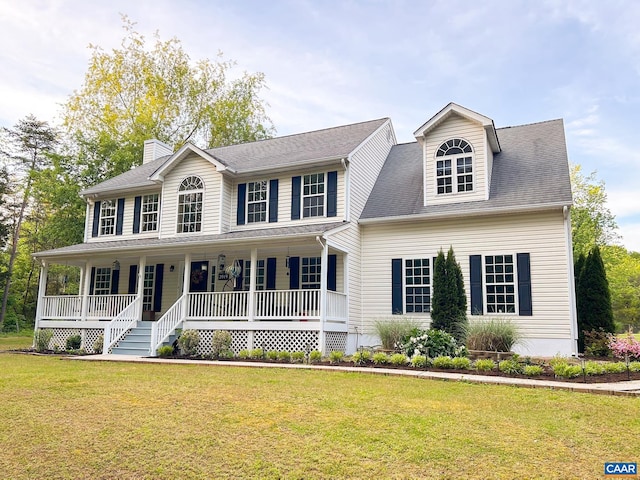 3919 Ruritan Lake Rd, Palmyra, VA 22963 - view of front facade with a chimney, a porch, and a front lawn