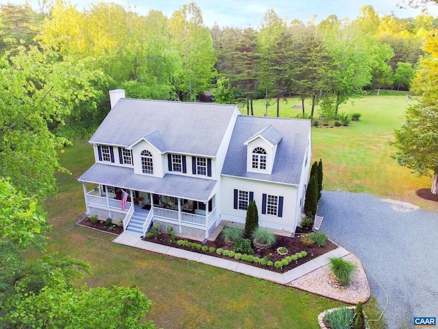 3919 Ruritan Lake Rd, Palmyra, VA 22963 - view of front of property featuring covered porch, a front yard, and a chimney