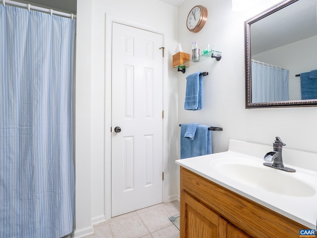 3919 Ruritan Lake Rd, Palmyra, VA 22963 - bathroom featuring tile patterned floors, vanity, baseboards, and a shower with curtain