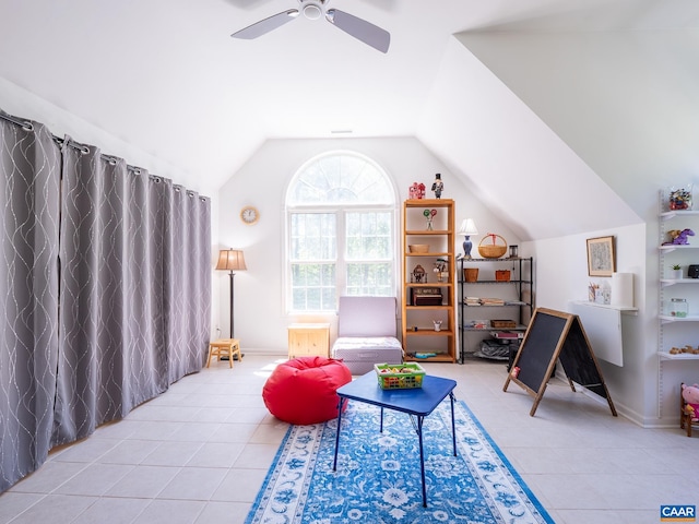 3919 Ruritan Lake Rd, Palmyra, VA 22963 - living area with tile patterned flooring, lofted ceiling, a ceiling fan, and baseboards