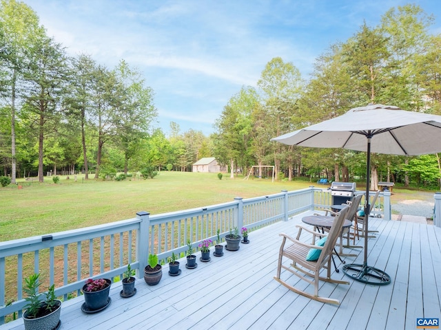 3919 Ruritan Lake Rd, Palmyra, VA 22963 - wooden deck featuring a lawn, area for grilling, view of scattered trees, and a playground