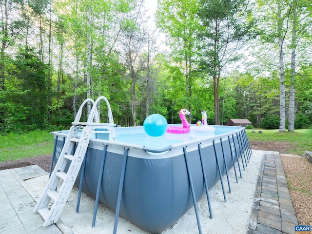 3919 Ruritan Lake Rd, Palmyra, VA 22963 - view of swimming pool featuring a forest view