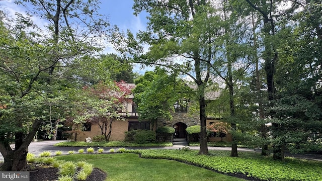 10129 Sorrel Ave, Potomac, MD 20854 - view of front facade with stone siding and a front lawn