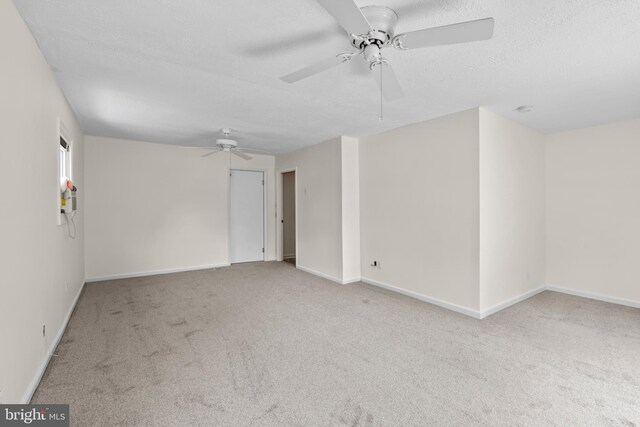 10699 Harding Rd, Laurel, MD 20723 - unfurnished room with ceiling fan, carpet, a textured ceiling, baseboards, and a smoke detector