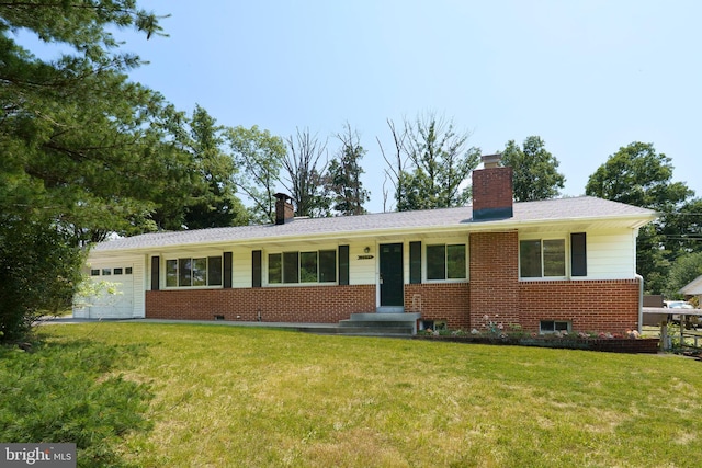 10699 Harding Rd, Laurel, MD 20723 - ranch-style home with a chimney, brick siding, a front lawn, and a garage