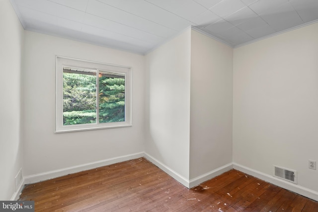 10699 Harding Rd, Laurel, MD 20723 - unfurnished room with hardwood / wood-style floors, ornamental molding, and baseboards