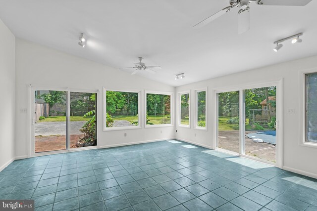 10699 Harding Rd, Laurel, MD 20723 - spare room with a ceiling fan, vaulted ceiling, tile patterned flooring, and baseboards