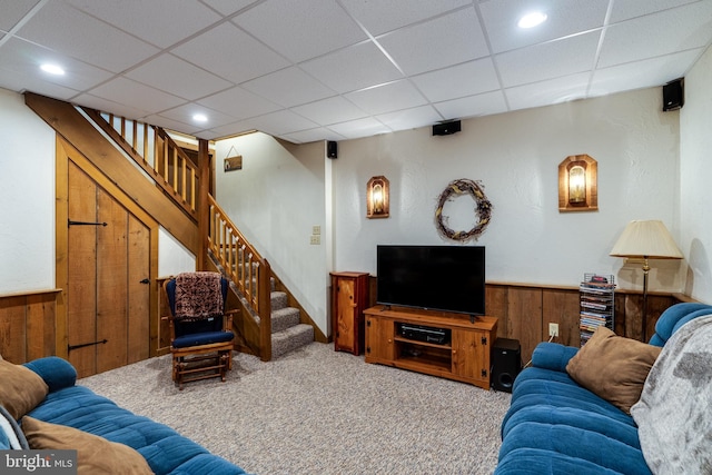 1626 Lampeter Rd, Lancaster, PA 17602 - living room with wooden walls, carpet, stairs, a paneled ceiling, and wainscoting