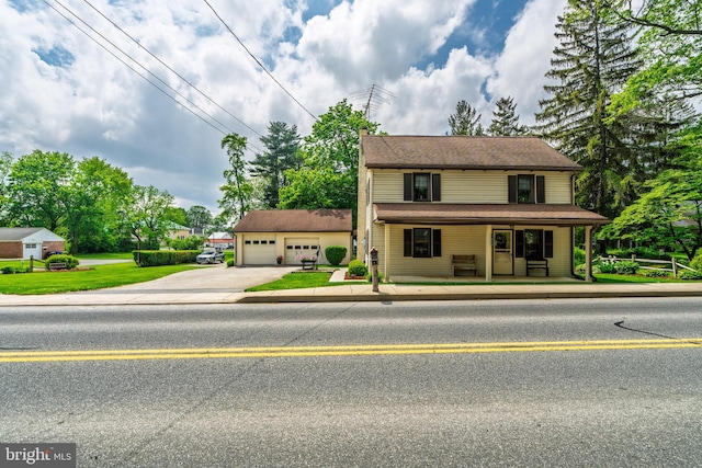 1626 Lampeter Rd, Lancaster, PA 17602 - view of front of property with a garage, driveway, a chimney, and a porch