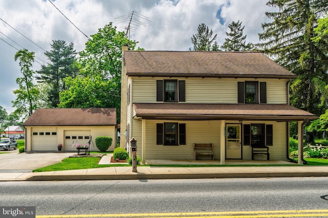 1626 Lampeter Rd, Lancaster, PA 17602 - view of front facade with a porch, a garage, and roof with shingles