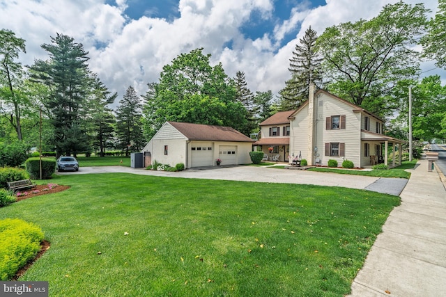 1626 Lampeter Rd, Lancaster, PA 17602 - view of front of house featuring a detached garage, an outbuilding, and a front yard