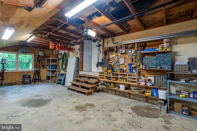 1626 Lampeter Rd, Lancaster, PA 17602 - garage with a workshop area and a garage door opener