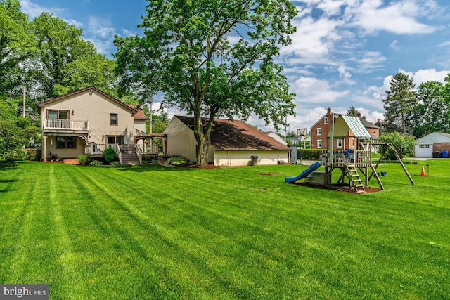 1626 Lampeter Rd, Lancaster, PA 17602 - view of green lawn with a playground and a wooden deck