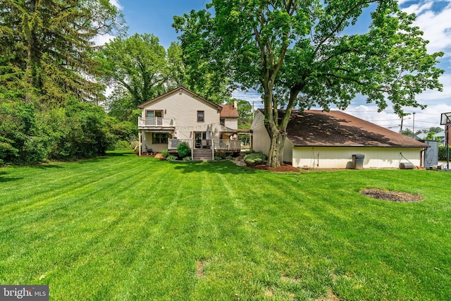 1626 Lampeter Rd, Lancaster, PA 17602 - rear view of house with a yard and a wooden deck