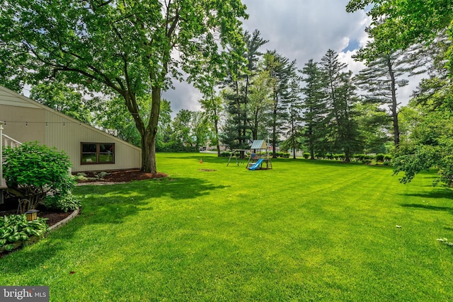 1626 Lampeter Rd, Lancaster, PA 17602 - view of green lawn featuring a playground and view of wooded area