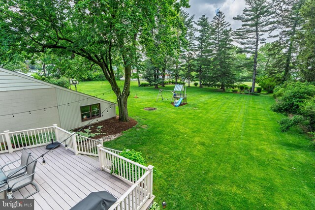 1626 Lampeter Rd, Lancaster, PA 17602 - view of grassy yard with a wooden deck and view of wooded area