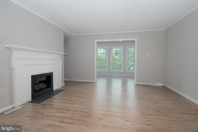 243 Loudoun St SW Unit F, Leesburg, VA 20175 - unfurnished living room with light wood-style floors, a fireplace with flush hearth, baseboards, and ornamental molding