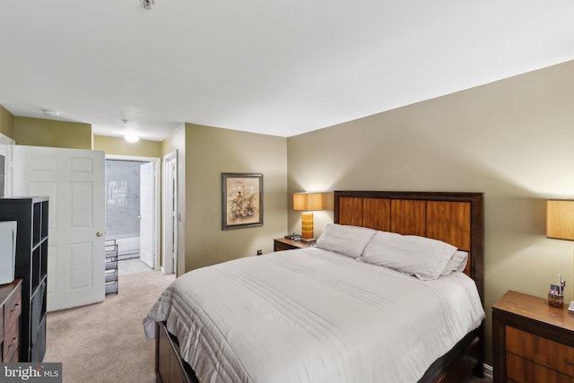 15609 Everglade Ln Unit F002, Bowie, MD 20716 - bedroom with light colored carpet and ensuite bathroom