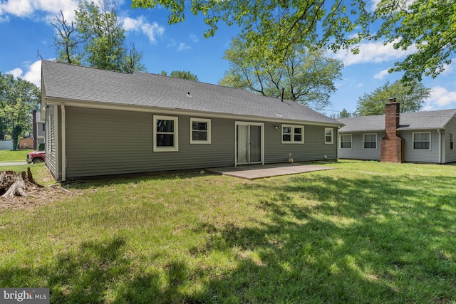 20 Executive Ln, Willingboro, NJ 08046 - back of house with a patio and a yard
