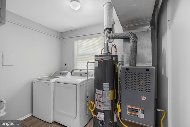 20 Executive Ln, Willingboro, NJ 08046 - washroom with gas water heater, washer and dryer, wood finished floors, and baseboards