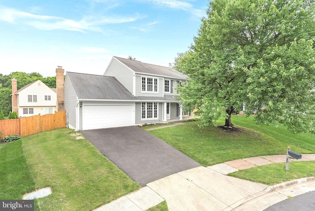 2619 Stone Mountain Ct, Herndon, VA 20170 - view of front facade with driveway, an attached garage, roof with shingles, and a chimney