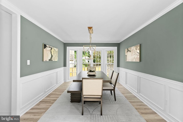 2619 Stone Mountain Ct, Herndon, VA 20170 - dining room with light wood-type flooring, ornamental molding, wainscoting, and a decorative wall