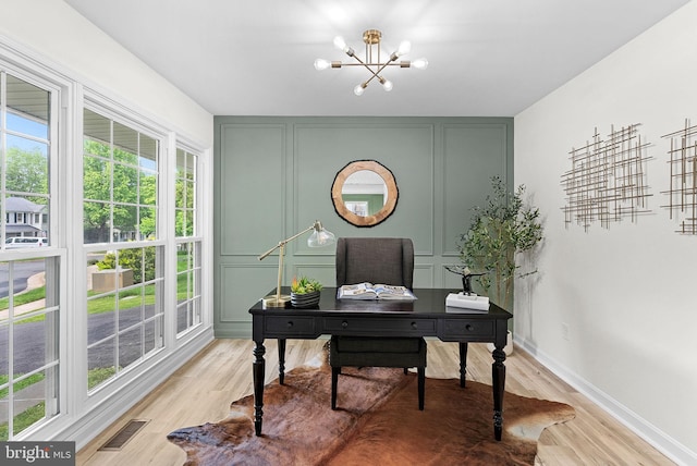 2619 Stone Mountain Ct, Herndon, VA 20170 - office with a chandelier, a decorative wall, light wood finished floors, and baseboards