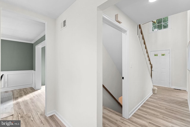 2619 Stone Mountain Ct, Herndon, VA 20170 - corridor with light wood-style flooring, an upstairs landing, stairs, and ornamental molding