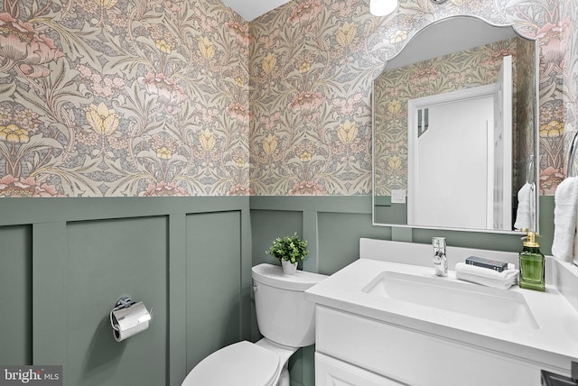 2619 Stone Mountain Ct, Herndon, VA 20170 - bathroom with wallpapered walls, toilet, and vanity