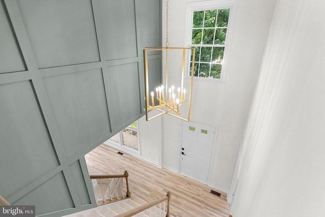 2619 Stone Mountain Ct, Herndon, VA 20170 - detailed view of wood finished floors, a chandelier, and baseboards