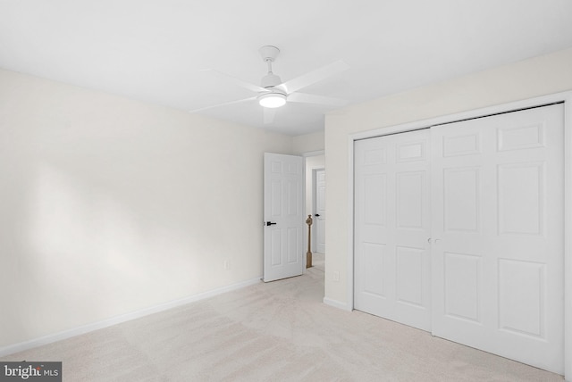 2619 Stone Mountain Ct, Herndon, VA 20170 - unfurnished bedroom with light colored carpet, a closet, baseboards, and a ceiling fan