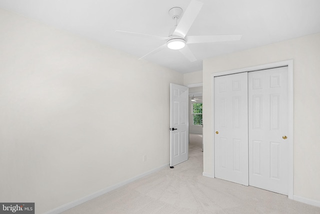 2619 Stone Mountain Ct, Herndon, VA 20170 - unfurnished bedroom with light colored carpet, baseboards, a closet, and a ceiling fan