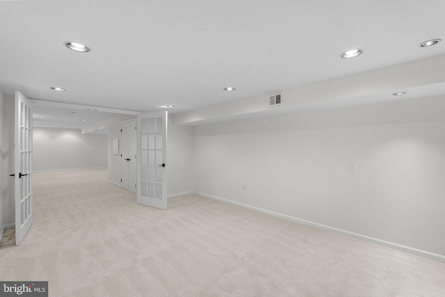2619 Stone Mountain Ct, Herndon, VA 20170 - finished basement with recessed lighting, french doors, baseboards, and light colored carpet