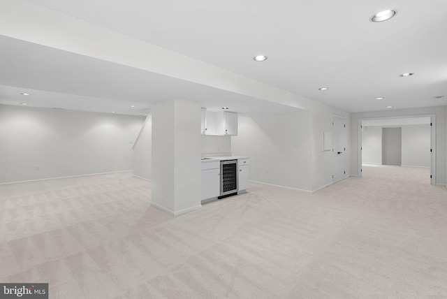 2619 Stone Mountain Ct, Herndon, VA 20170 - finished below grade area featuring wine cooler, light colored carpet, baseboards, and recessed lighting
