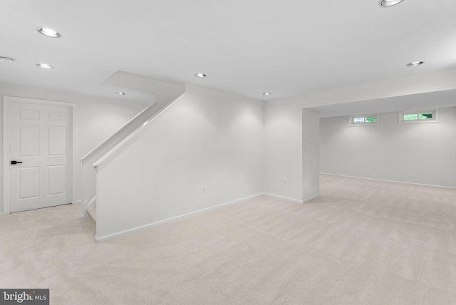2619 Stone Mountain Ct, Herndon, VA 20170 - below grade area featuring light colored carpet, recessed lighting, baseboards, and stairs
