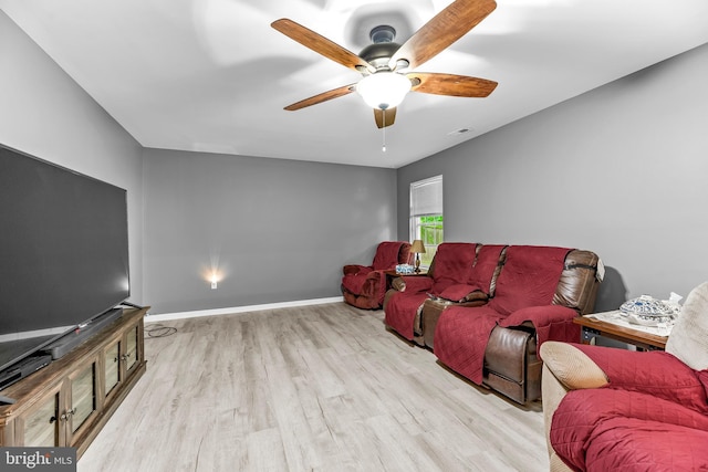 8328 Ridge View Rd, Lusby, MD 20657 - cinema room with wood finished floors, a ceiling fan, and baseboards