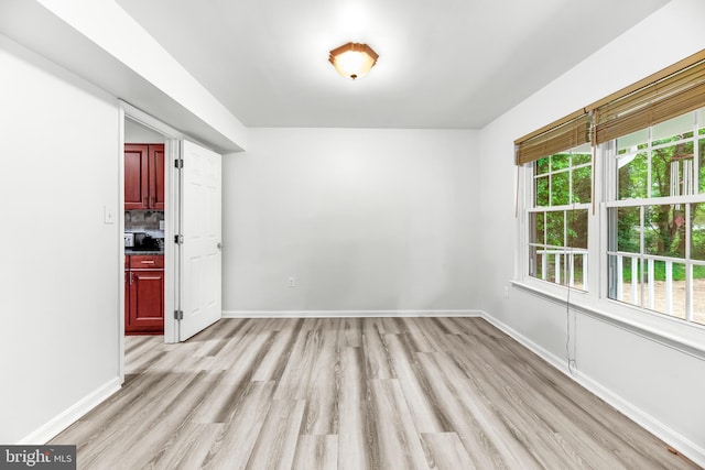 8328 Ridge View Rd, Lusby, MD 20657 - unfurnished room featuring light wood-style floors and baseboards