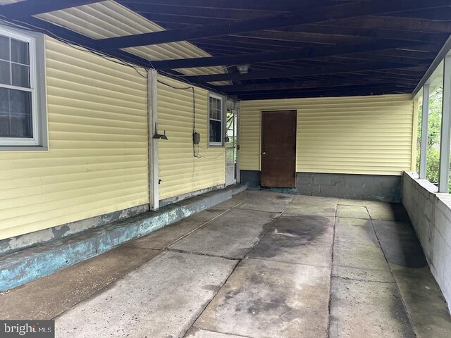 view of patio with an attached carport