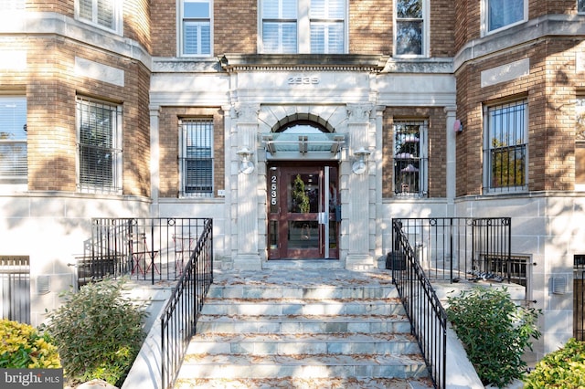 entrance to property with stone siding
