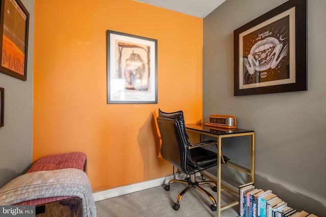 carpeted office with baseboards