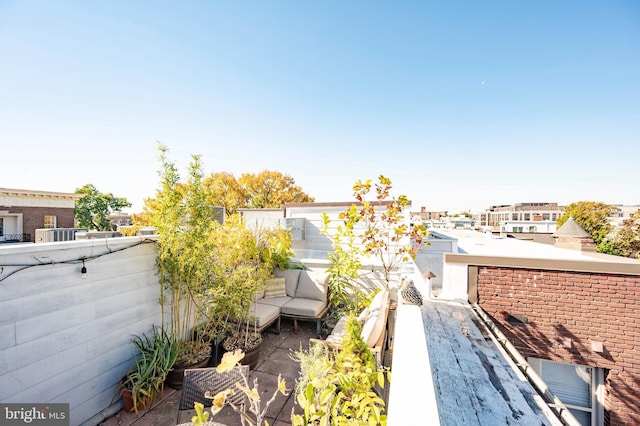 view of patio / terrace with fence and an outdoor hangout area