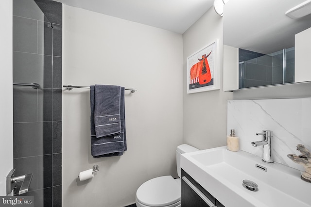 721 S Smedley St, Philadelphia, PA 19146 - bathroom featuring toilet, vanity, and a tile shower