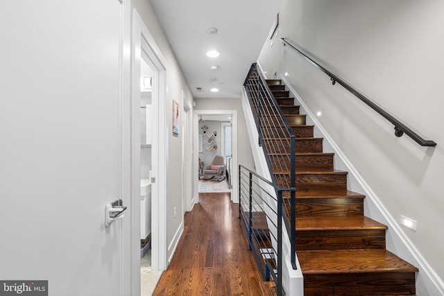 721 S Smedley St, Philadelphia, PA 19146 - stairway with wood finished floors, recessed lighting, and baseboards