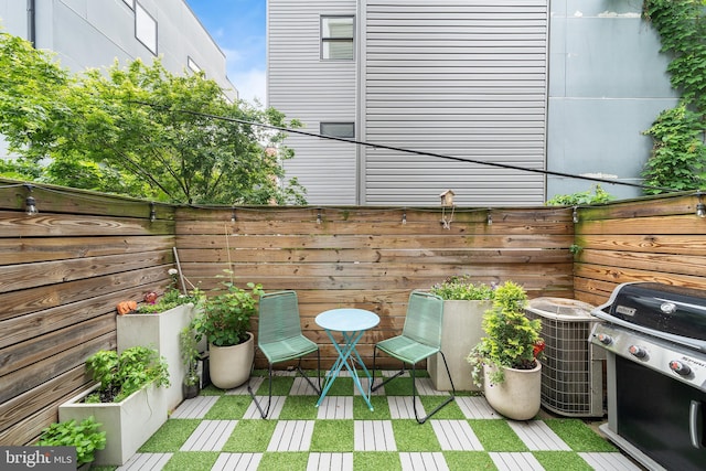 721 S Smedley St, Philadelphia, PA 19146 - view of patio featuring grilling area and cooling unit