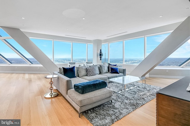 50 S 16th St Unit 5401, Philadelphia, PA 19102 - living area featuring wood finished floors, a water view, and baseboards
